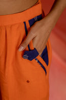 Saanjh- Kotpad Orange Straight Handloom Cotton pants with borders, Prathaa
