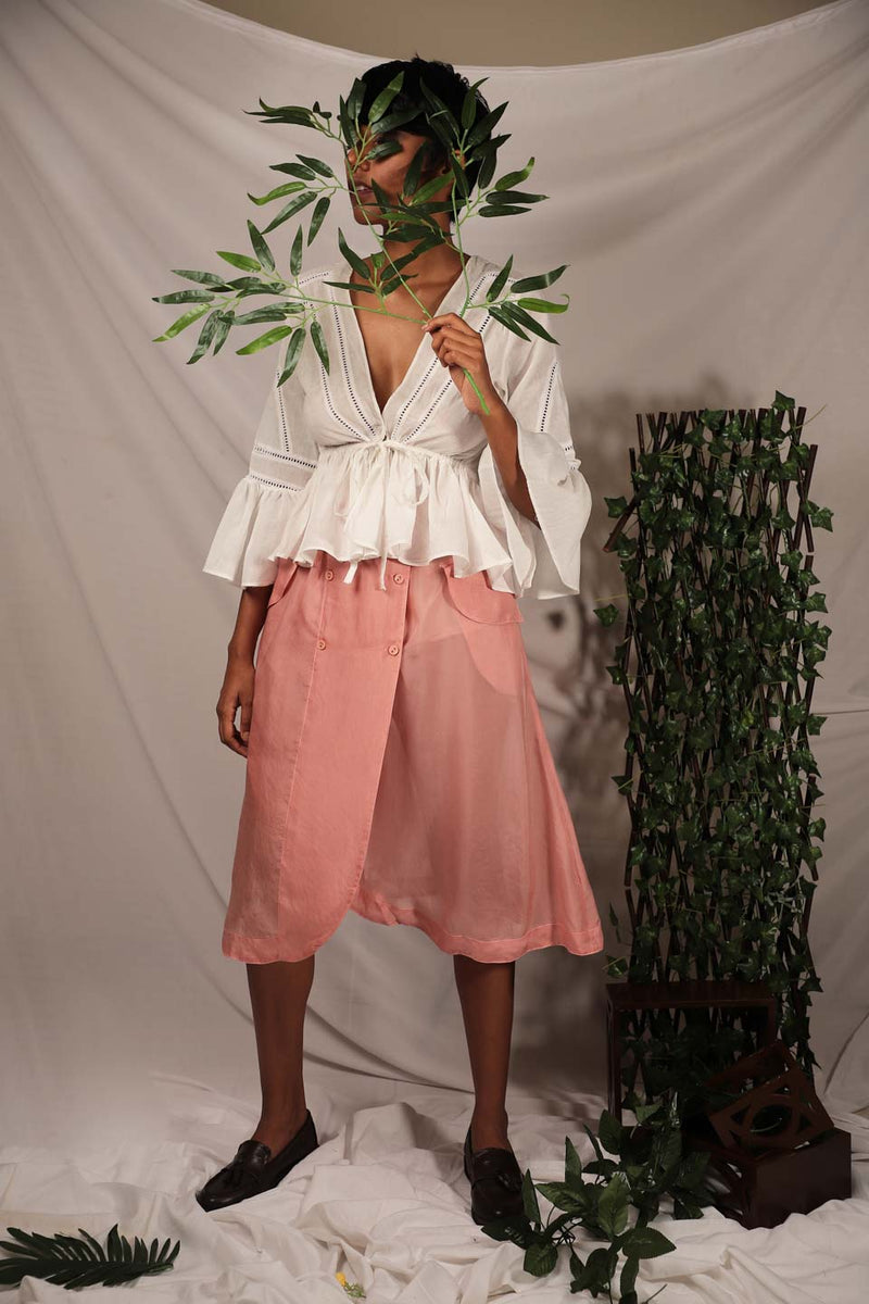 Ethically made Flamingo Pink pepper silk skirt with overlap and button details
