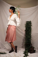 Ethically made Flamingo Pink pepper silk skirt with overlap and button details