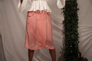 Ethically made Flamingo Pink pepper silk skirt with overlap and button details