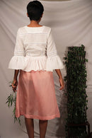 Ethically made Flamingo Pink pepper silk skirt with overlap and button details