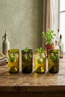 O.U.A.T. Olive Upcycled Drinking Glasses - Set of 4 | 250 ml Each | Handcrafted from Reclaimed Olive Wine Bottles | Includes Natural Cork Coasters