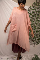 Ethically made Pink pepper silk Poncho with tie up sleeves detail, perfect for those hot summer layering