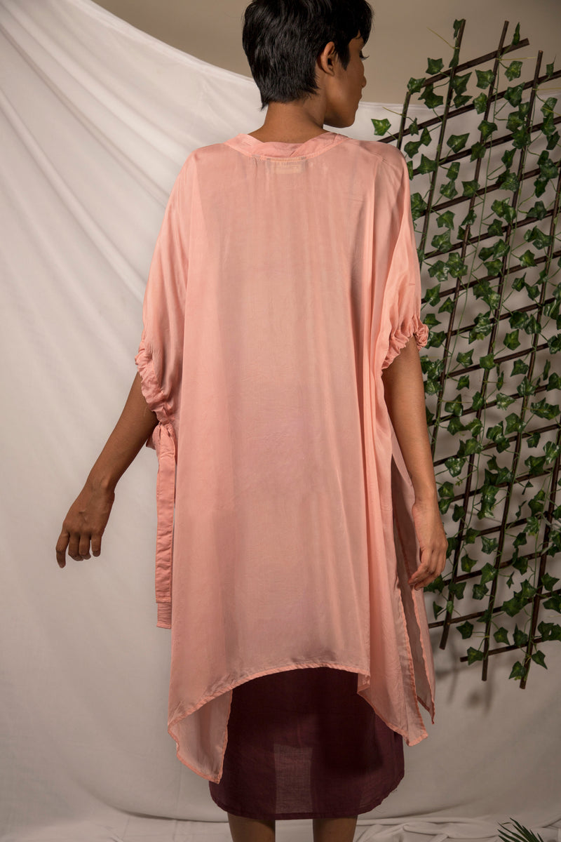 Ethically made Pink pepper silk Poncho with tie up sleeves detail, perfect for those hot summer layering