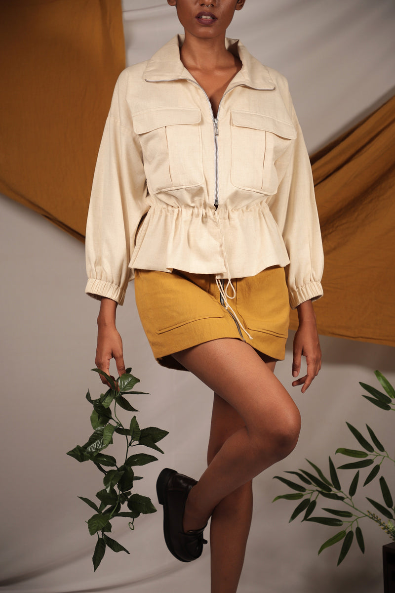 Ethically made Ivory linen Bomber jacket with tie up details to cinch your waist and chest pockets