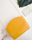 Whitefire Vegan Leather Dome Sling Bag in Amber Yellow