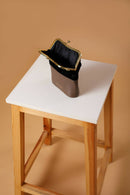 X Feet Above Ethically Made Ara Clasp Bag